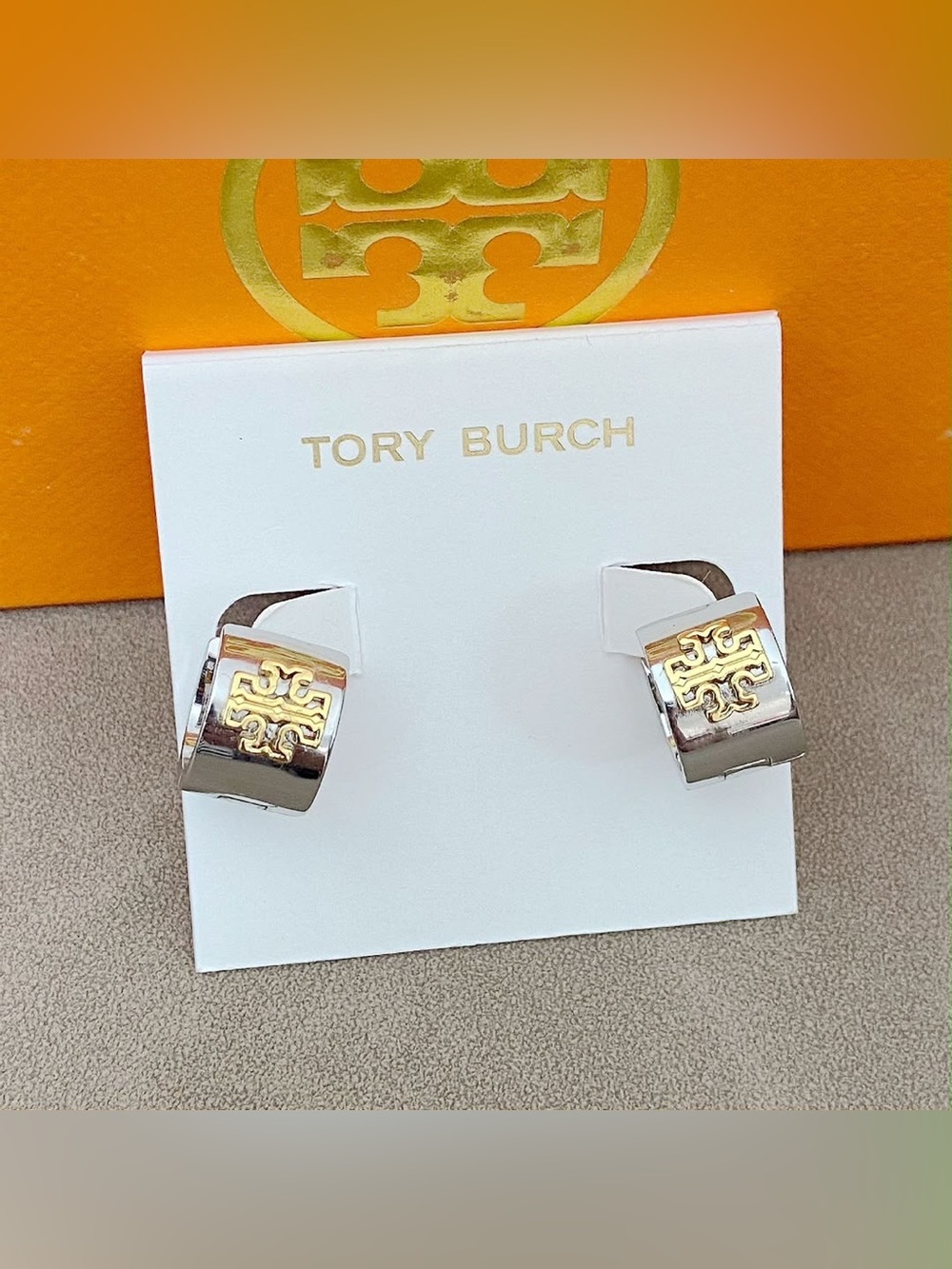 Tory Burch Two-Tone Mini Hoop Earrings in Silver with Gold Logo